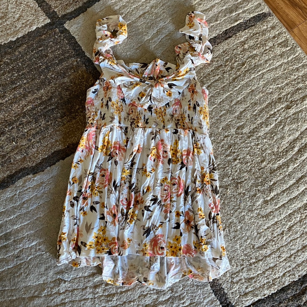 Swing tank top